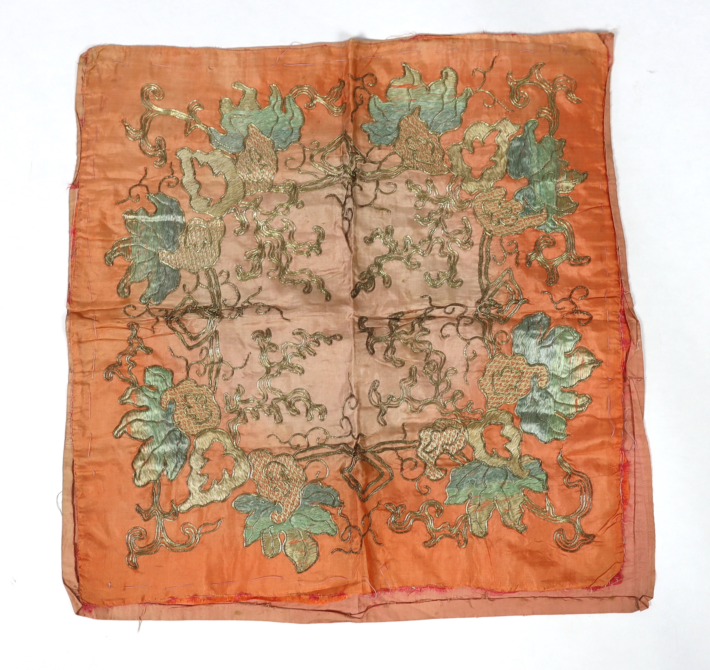An early 20th century silk crêpe Japanese kimono and fringed tie belt, the back panel heavily embroidered with trailing chrysanthemum type flowers and leaves. This item is being sold for the back panel only and is with a